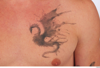 Lyle chest tattoo 0001.jpg